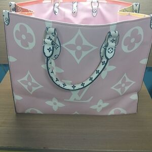 Stylish Pink Tote Bag with Iconic Patterns